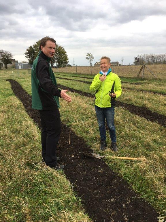 Henrik Lindner and Irene Smetana standing in tree plantation field